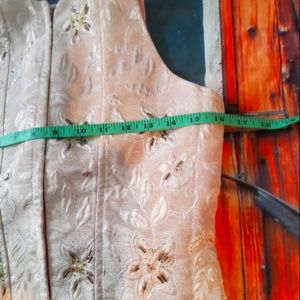 Top shiny with beads.